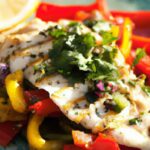 Zesty Fish Chermoula Paired with Vibrant Grilled Peppers