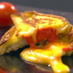 Melted Delight: Grilled Cheese with Tomato & Basil Twist