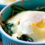 Golden Baked Eggs with Spinach and Creamy Gruyère Bliss