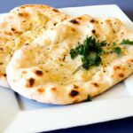 Herb-Infused Cheese-Stuffed Naan: A Flavorful Twist