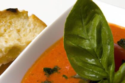 Roasted Tomato Bisque Infused with Fragrant Basil Oil