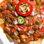 Huaraches Delight: Nopales and Salsa Roja Topped Perfection
