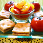 Savory Bites: Diced Tomatoes & Basil on Crispy Crackers