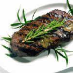 Savor the Flavor: Grilled Steak with Rosemary Butter Bliss