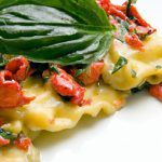 Savor Delight: Lobster Ravioli in Luxurious Basil Cream