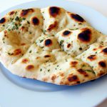 Herb-Infused Cheese-Stuffed Naan: A Flavorful Delight